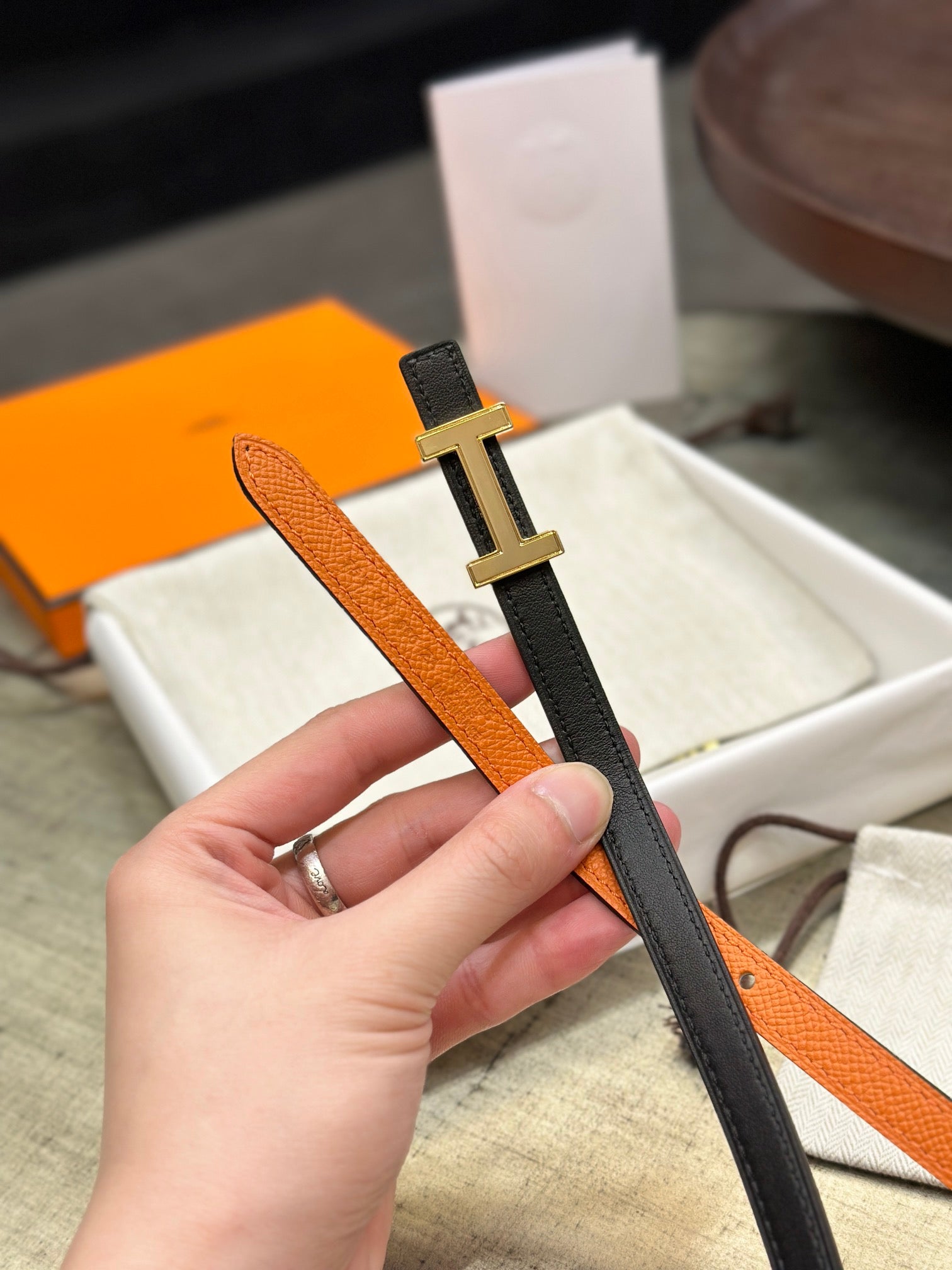 HERMES FOCUS BUCKLE & REVERSIBLE BLACK AND ORANGE LEATHER STRAP 13MM GOLD HARDWARE